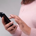 image-closeup-female-hands-using-smart-600nw-2575559059